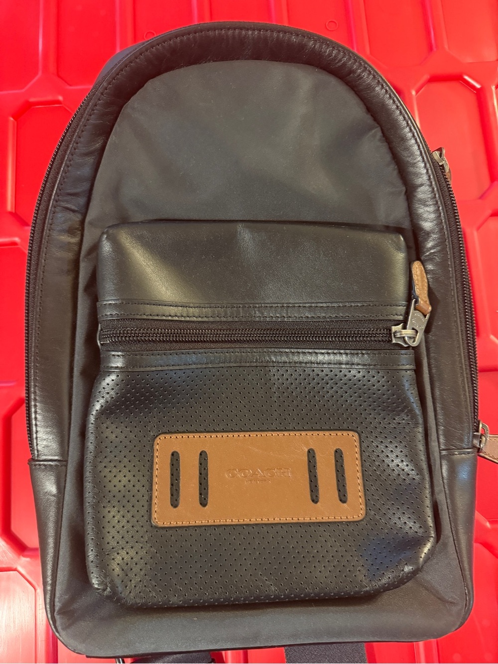 Coach Black Sling Bag with Brown Leather Patch